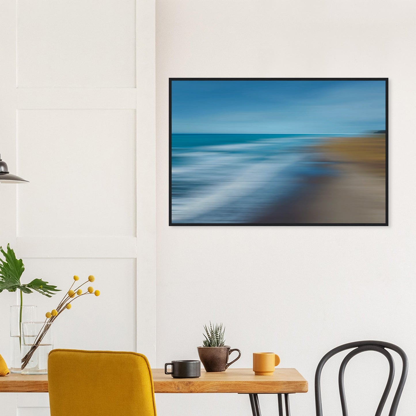 ‘Ocean breeze’ captures the movement of waves and shoreline in a beautifully blurred perspective, creating a dreamlike seascape of blues, teals, and sandy browns.