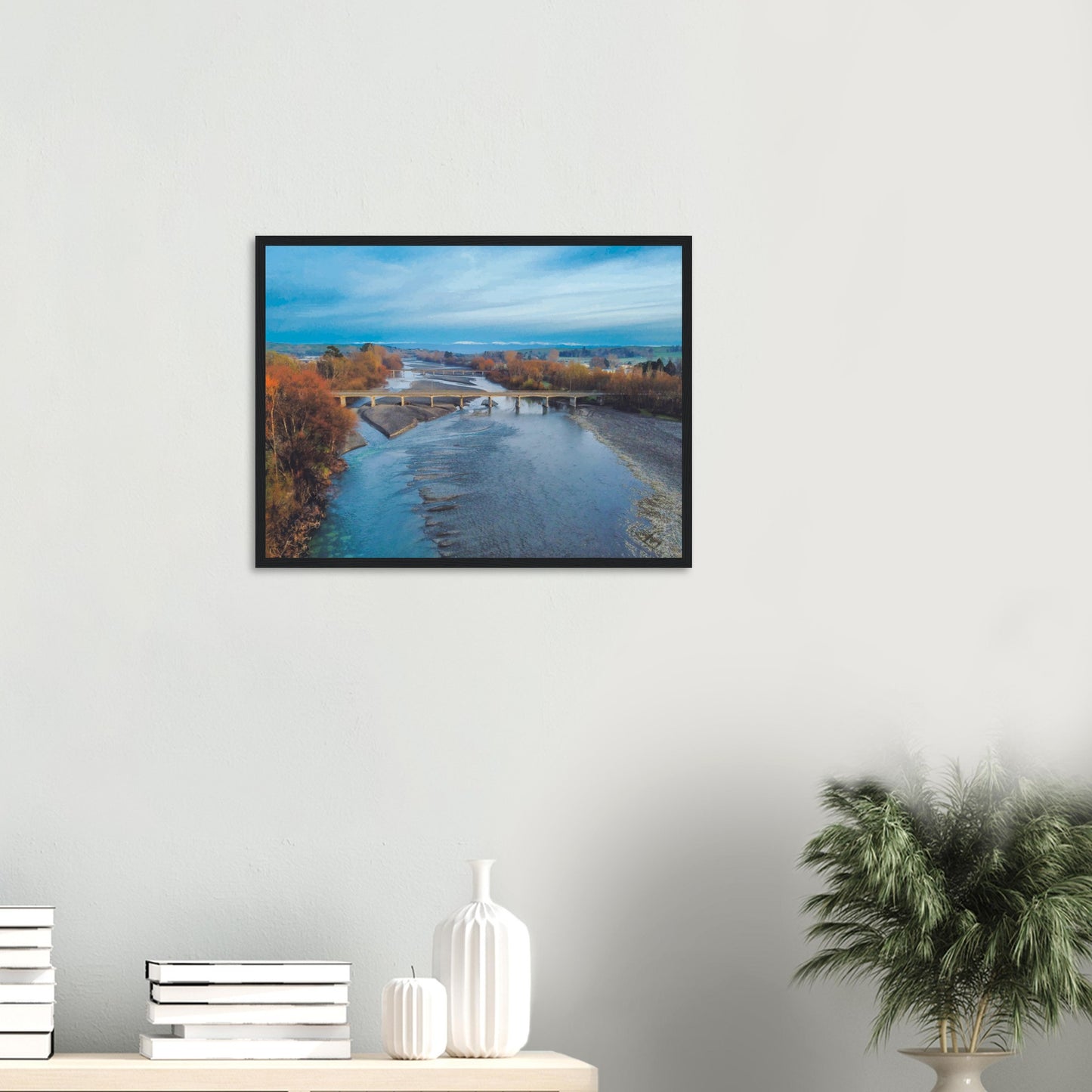 Aerial artwork of bridges crossing the Tuki Tuki River with the Ruahine Ranges in the distance, in cool, calm light.