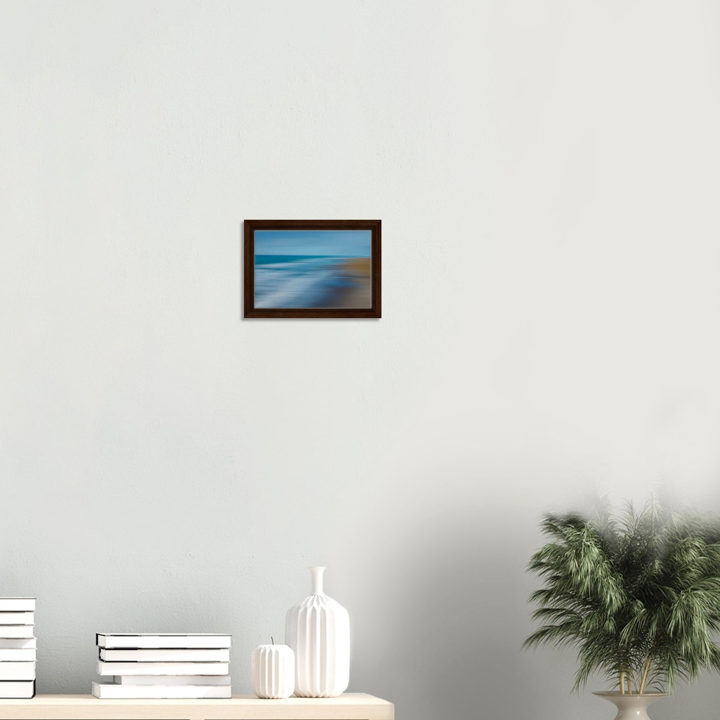 ‘Ocean breeze’ captures the movement of waves and shoreline in a beautifully blurred perspective, creating a dreamlike seascape of blues, teals, and sandy browns.