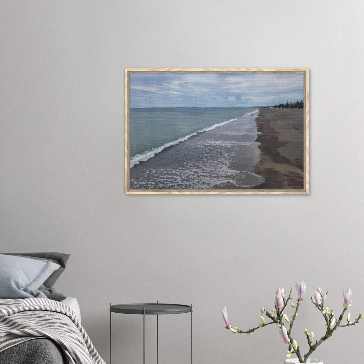 Gentle waves roll onto the dark sand, stretching endlessly into the distance under a softly clouded sky. Hints of pine trees and distant land complete the scene