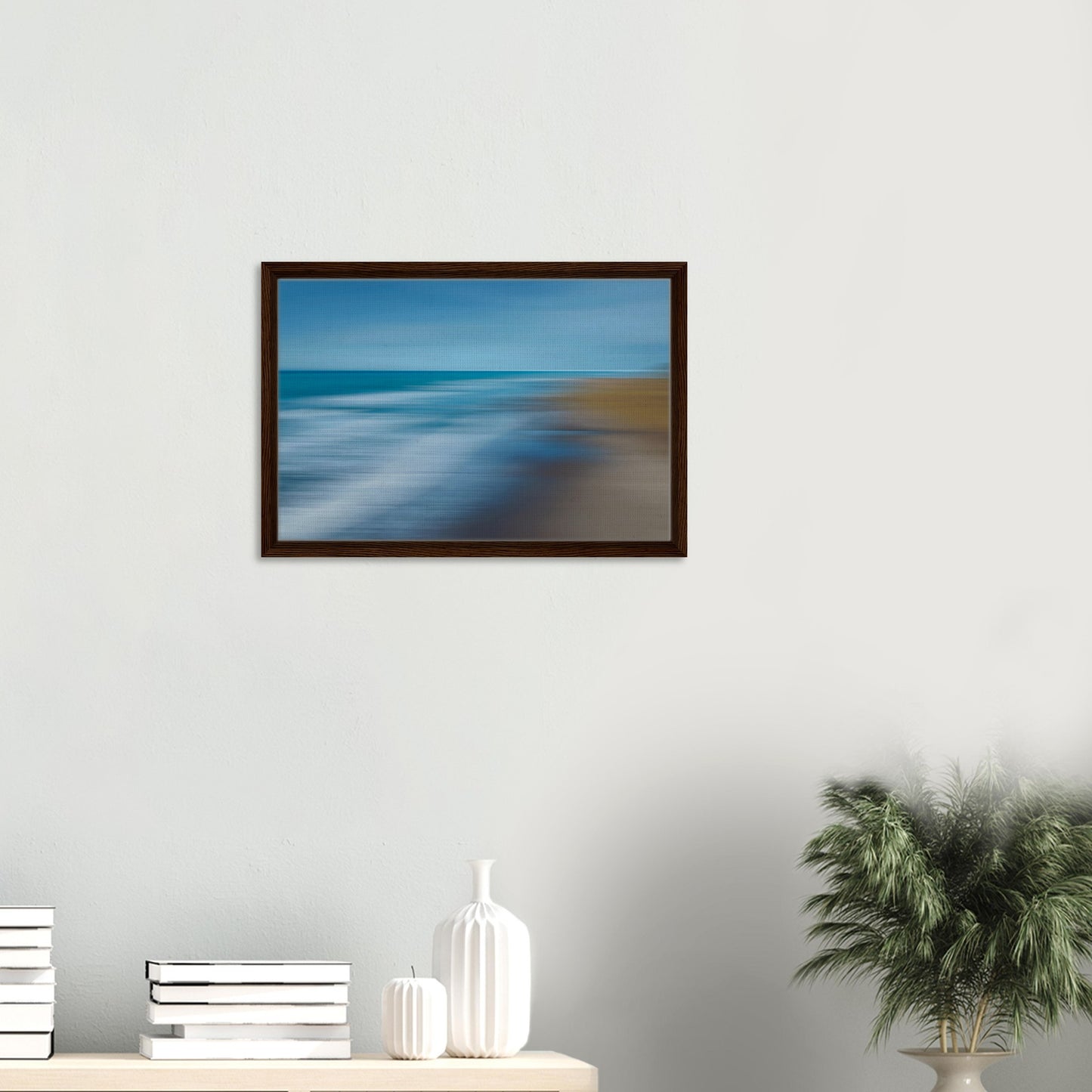 ‘Ocean breeze’ captures the movement of waves and shoreline in a beautifully blurred perspective, creating a dreamlike seascape of blues, teals, and sandy browns.