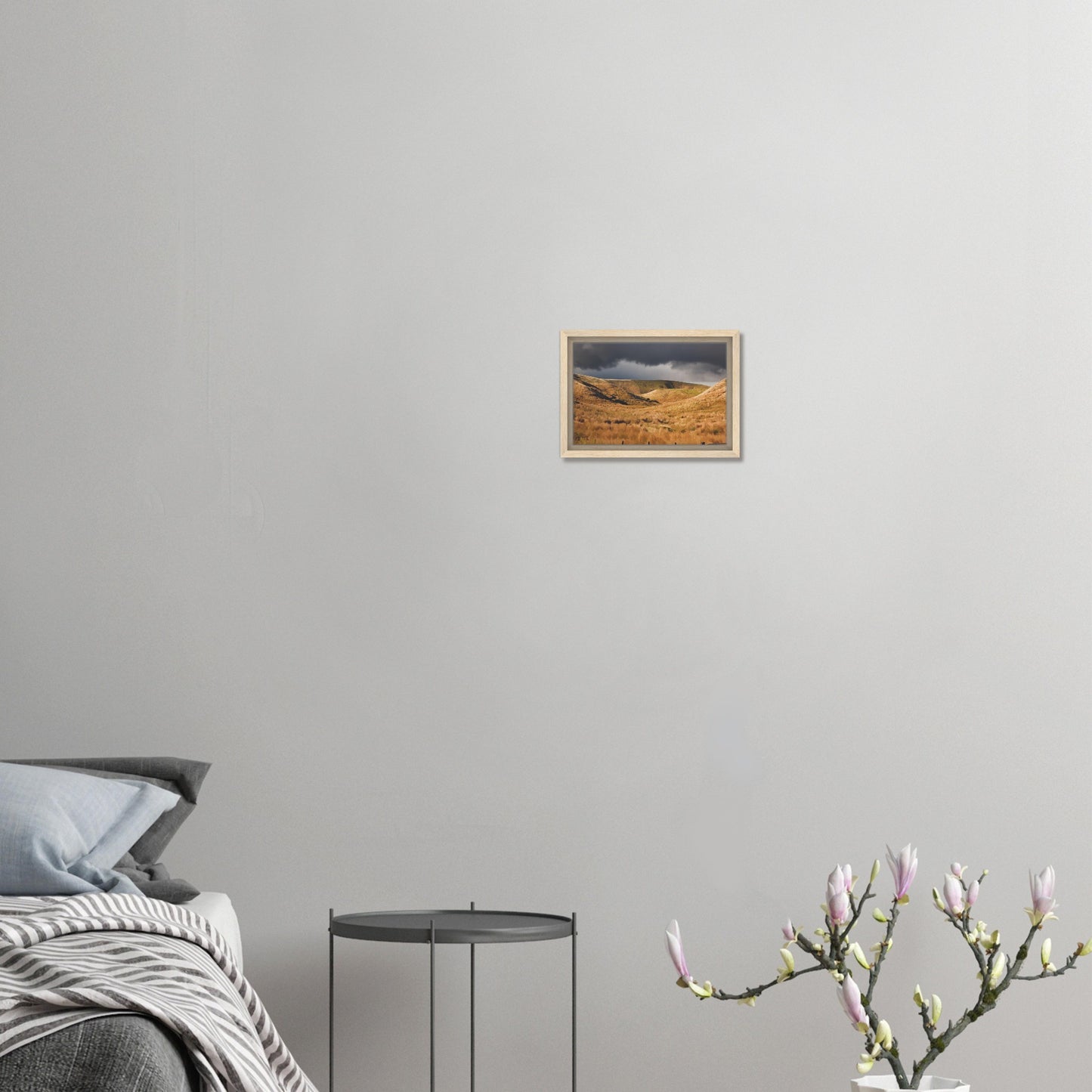 Golden Hawke’s Bay hills beneath dark clouds in a nostalgic NZ landscape artwork titled Trip Home by Ben Hart.