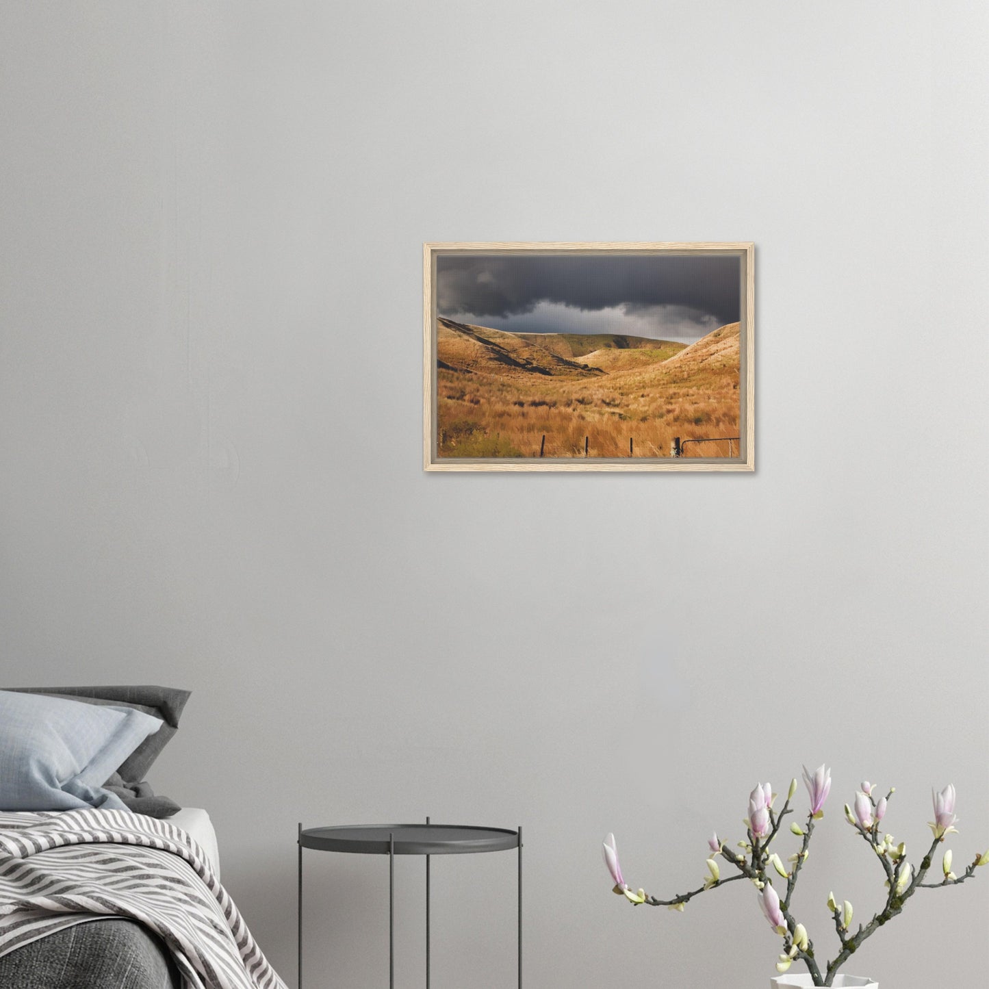 Golden Hawke’s Bay hills beneath dark clouds in a nostalgic NZ landscape artwork titled Trip Home by Ben Hart.