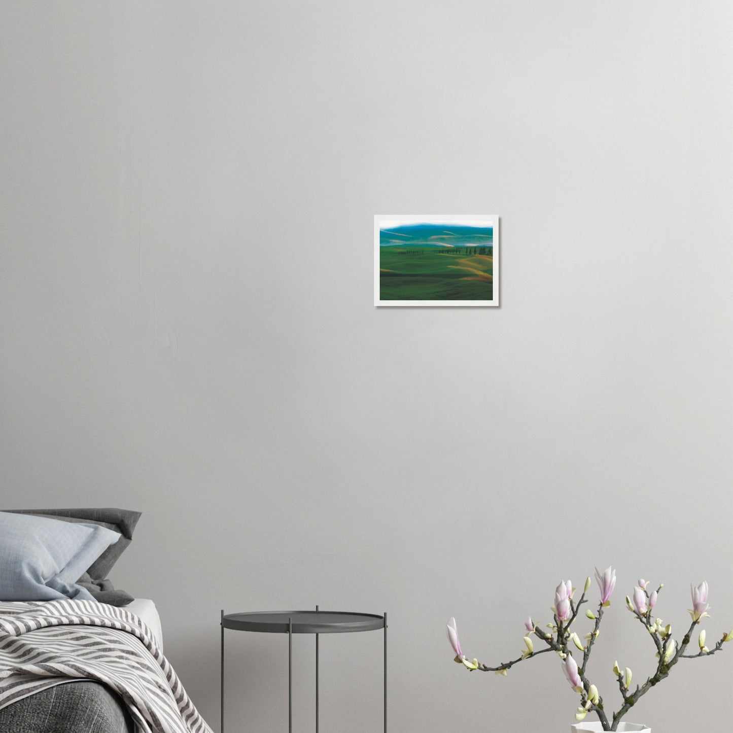 Artwork of rolling green hills and tall trees in soft golden light, evoking calm and quiet.