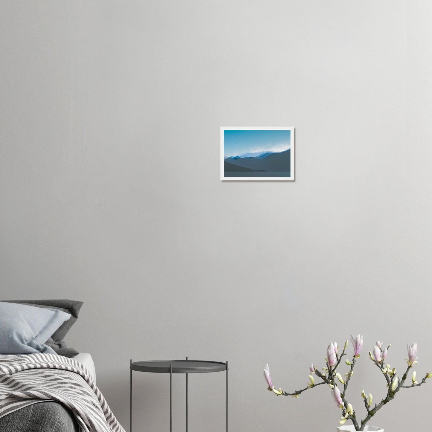 Layered blue mountain ridges fading into mist under a soft sky, evoking calm and simplicity.