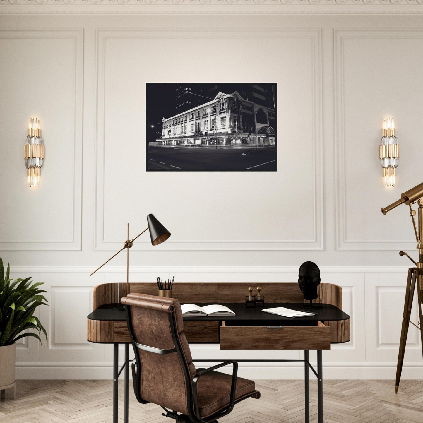 Monochrome artwork of Wellington’s Kirkaldie and Stains building lit at night, showcasing historic architectural details.