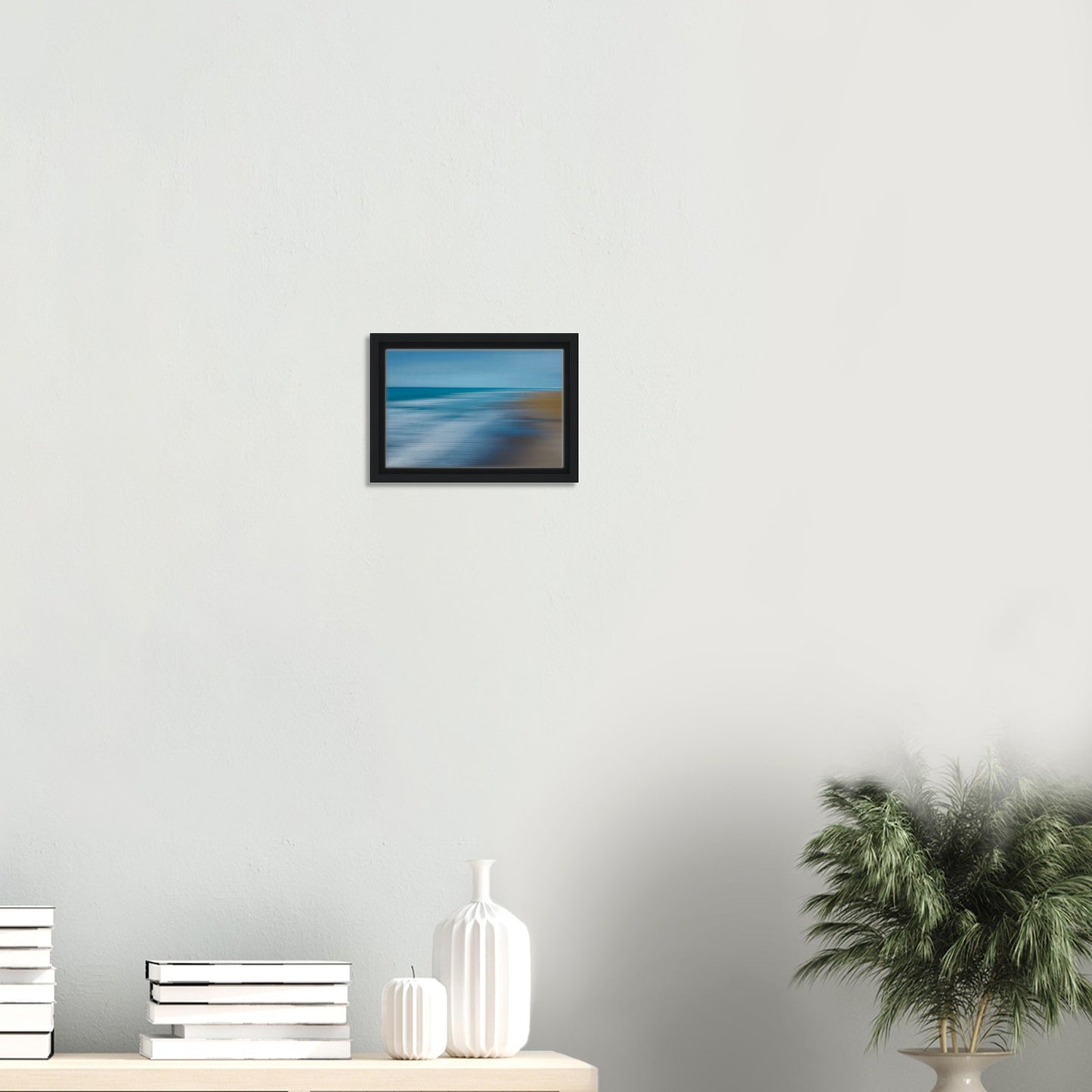 ‘Ocean breeze’ captures the movement of waves and shoreline in a beautifully blurred perspective, creating a dreamlike seascape of blues, teals, and sandy browns.
