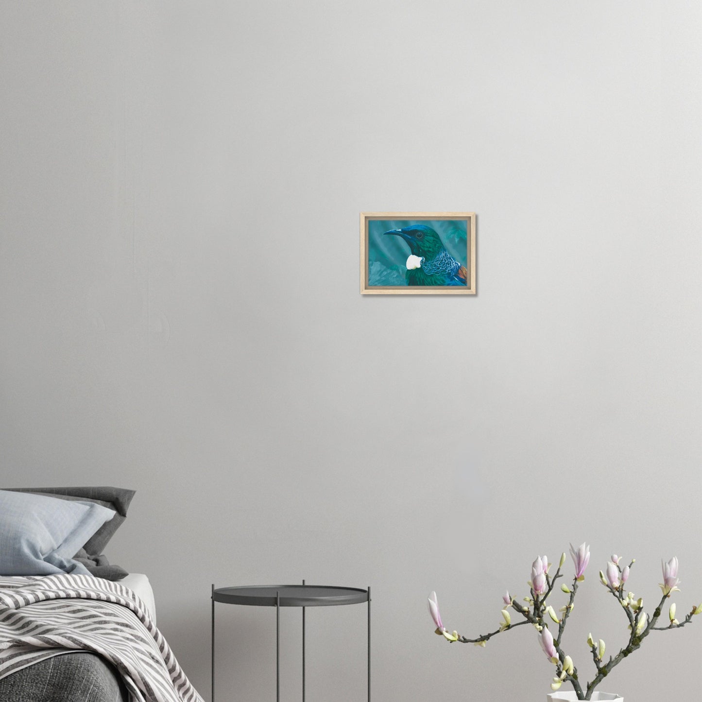 With rich teal and emerald hues and the tūī’s signature white throat tufts, the artwork evokes the dappled light of the forest and the bird’s melodic presence among the trees.