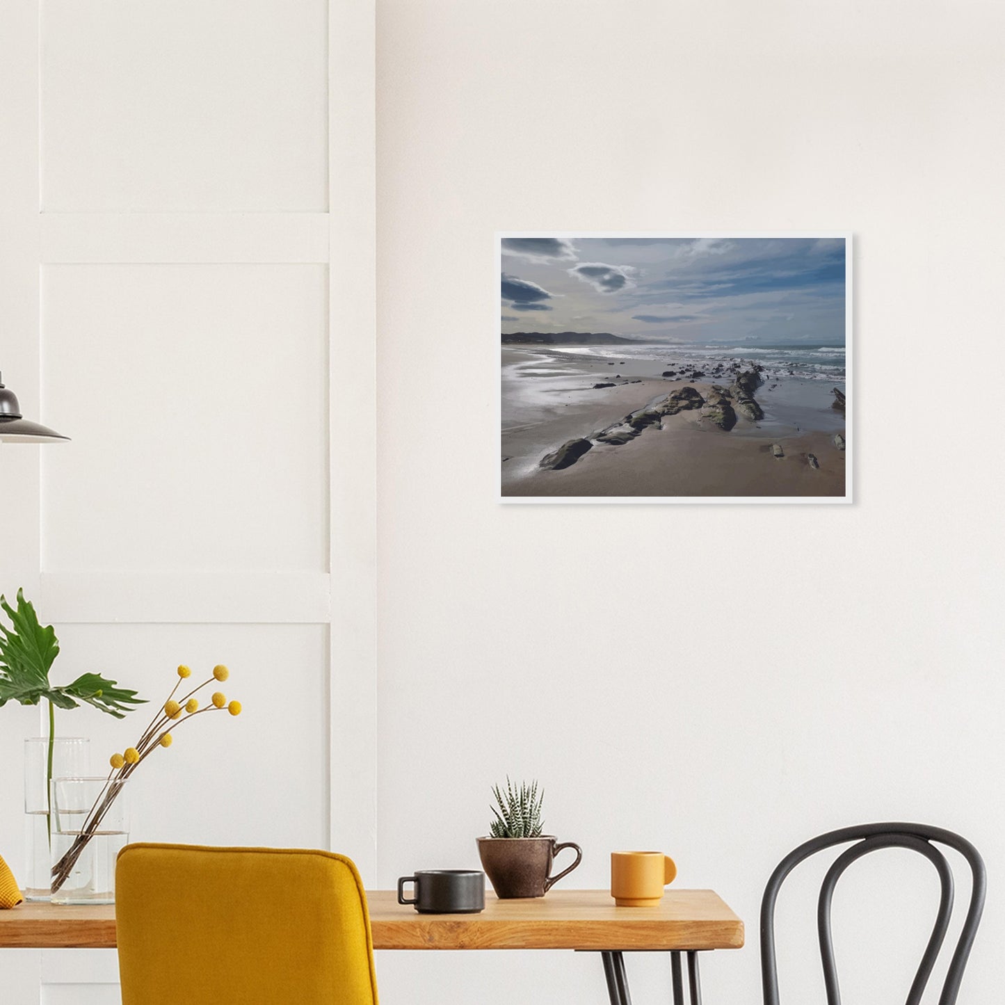 A moody, windswept beach and a line of sea-weathered rocks stretching into the distance, this artwork captures the raw, untouched feel of a wild shoreline.