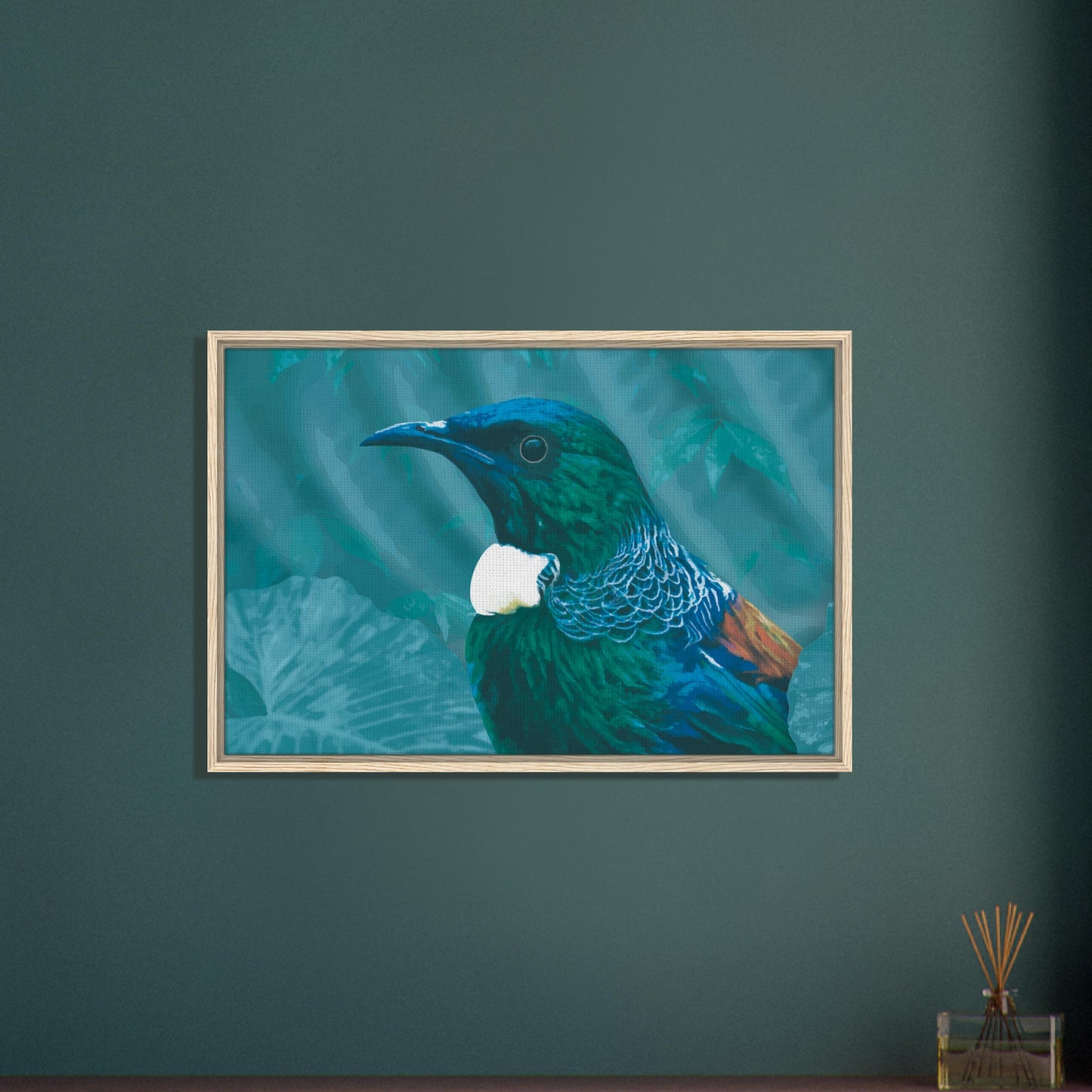 With rich teal and emerald hues and the tūī’s signature white throat tufts, the artwork evokes the dappled light of the forest and the bird’s melodic presence among the trees.