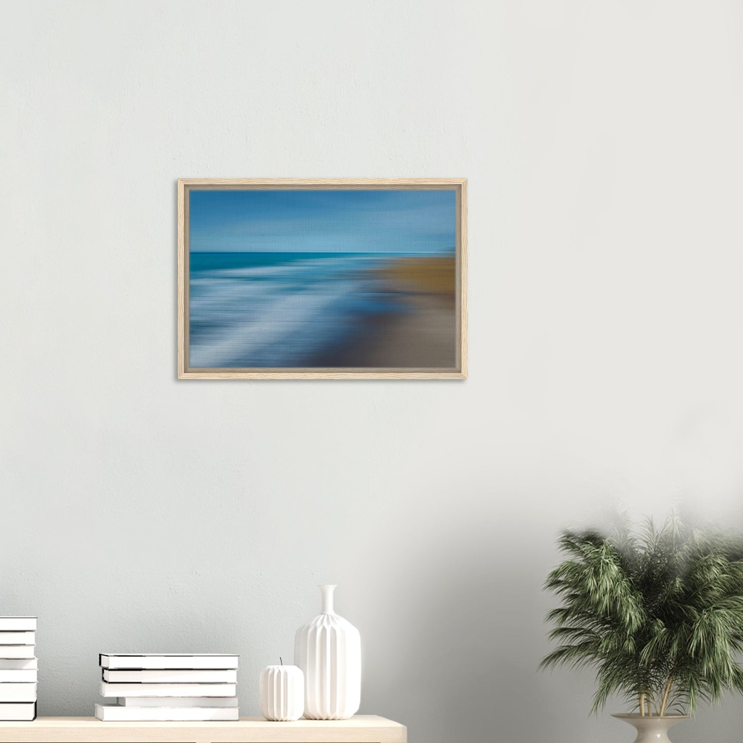 ‘Ocean breeze’ captures the movement of waves and shoreline in a beautifully blurred perspective, creating a dreamlike seascape of blues, teals, and sandy browns.