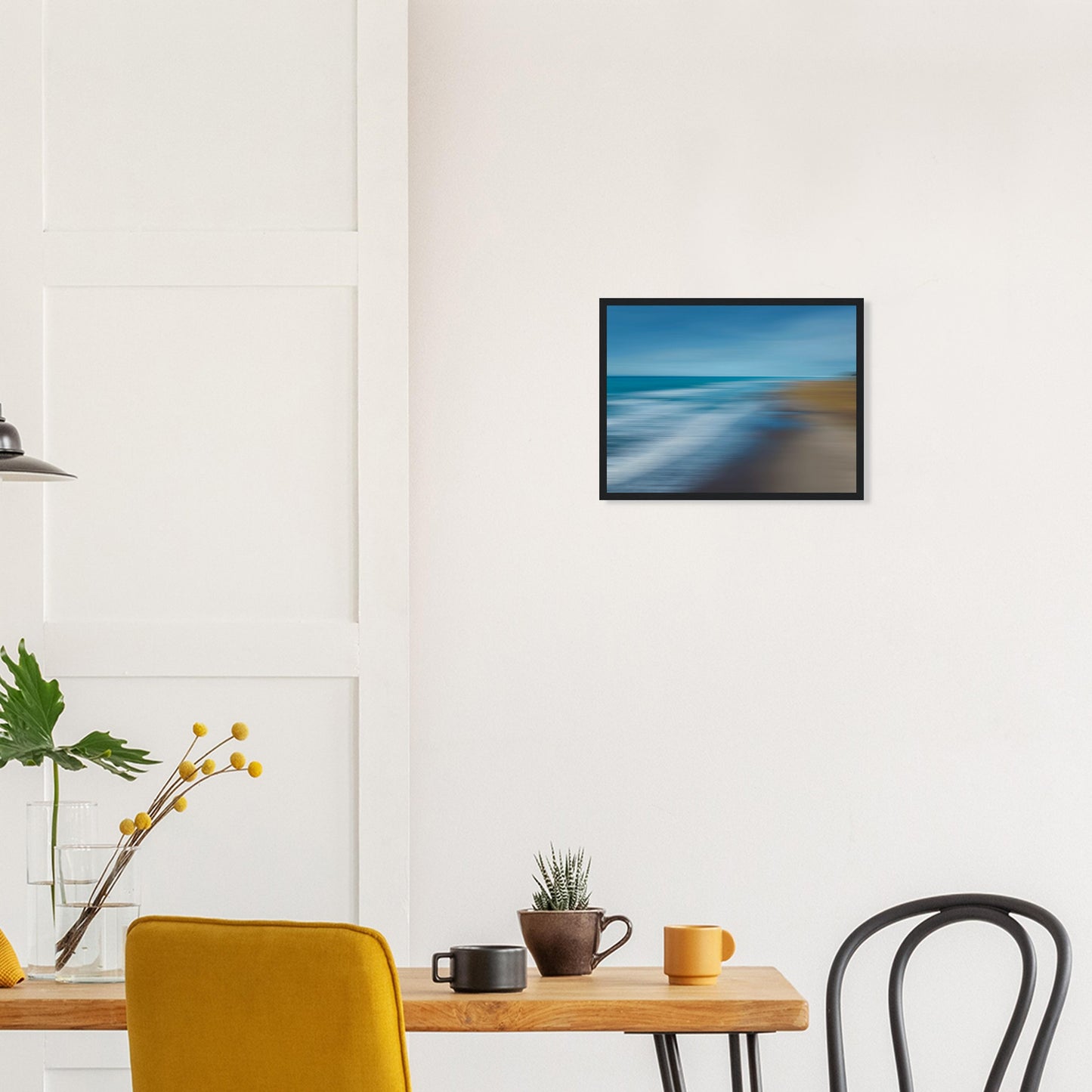 ‘Ocean breeze’ captures the movement of waves and shoreline in a beautifully blurred perspective, creating a dreamlike seascape of blues, teals, and sandy browns.