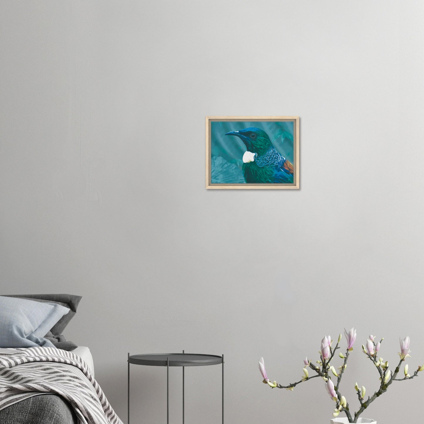 With rich teal and emerald hues and the tūī’s signature white throat tufts, the artwork evokes the dappled light of the forest and the bird’s melodic presence among the trees.