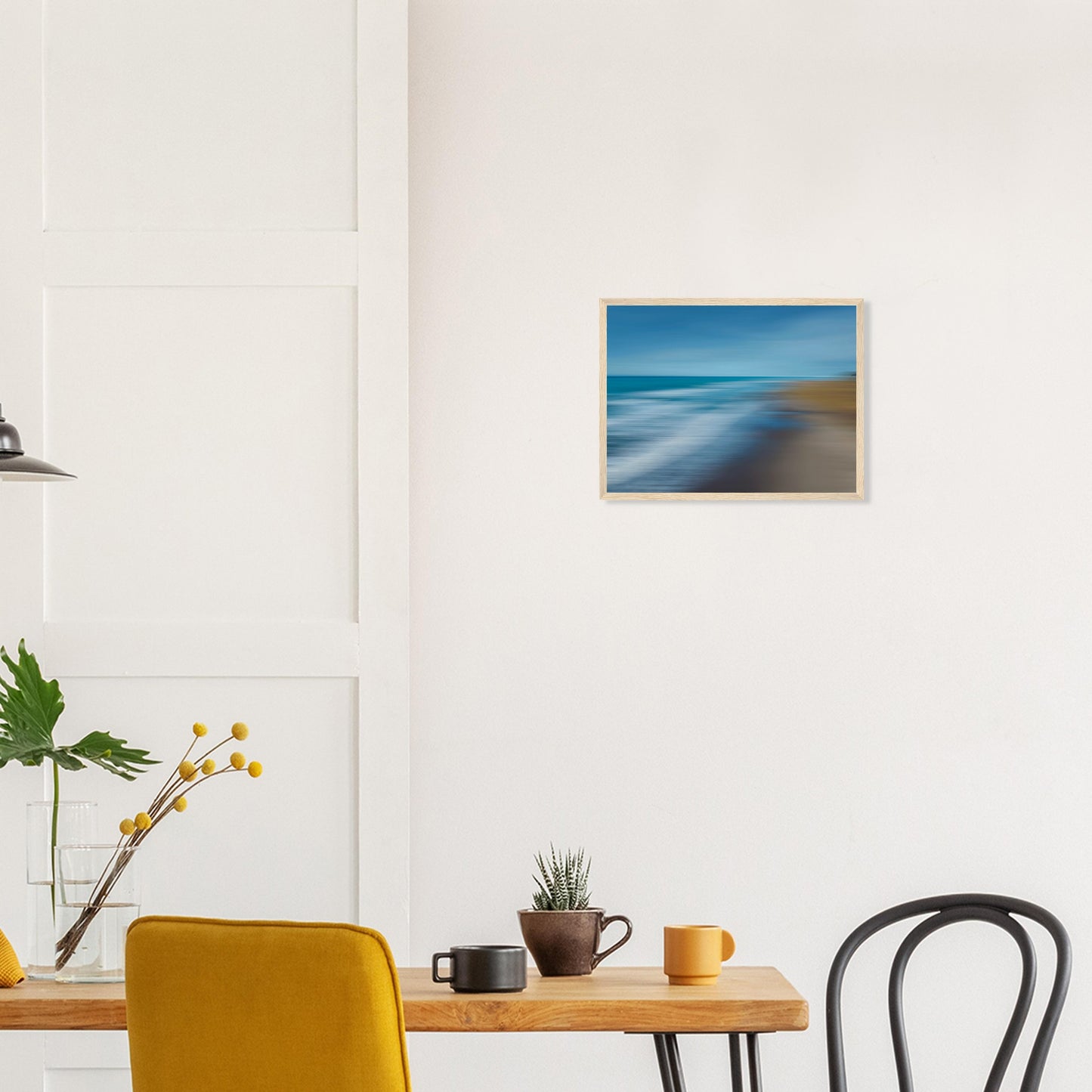 ‘Ocean breeze’ captures the movement of waves and shoreline in a beautifully blurred perspective, creating a dreamlike seascape of blues, teals, and sandy browns.