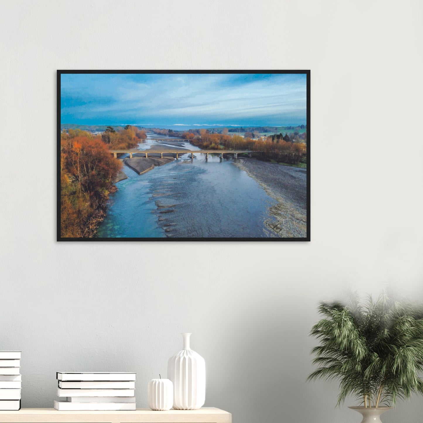 Aerial artwork of bridges crossing the Tuki Tuki River with the Ruahine Ranges in the distance, in cool, calm light.