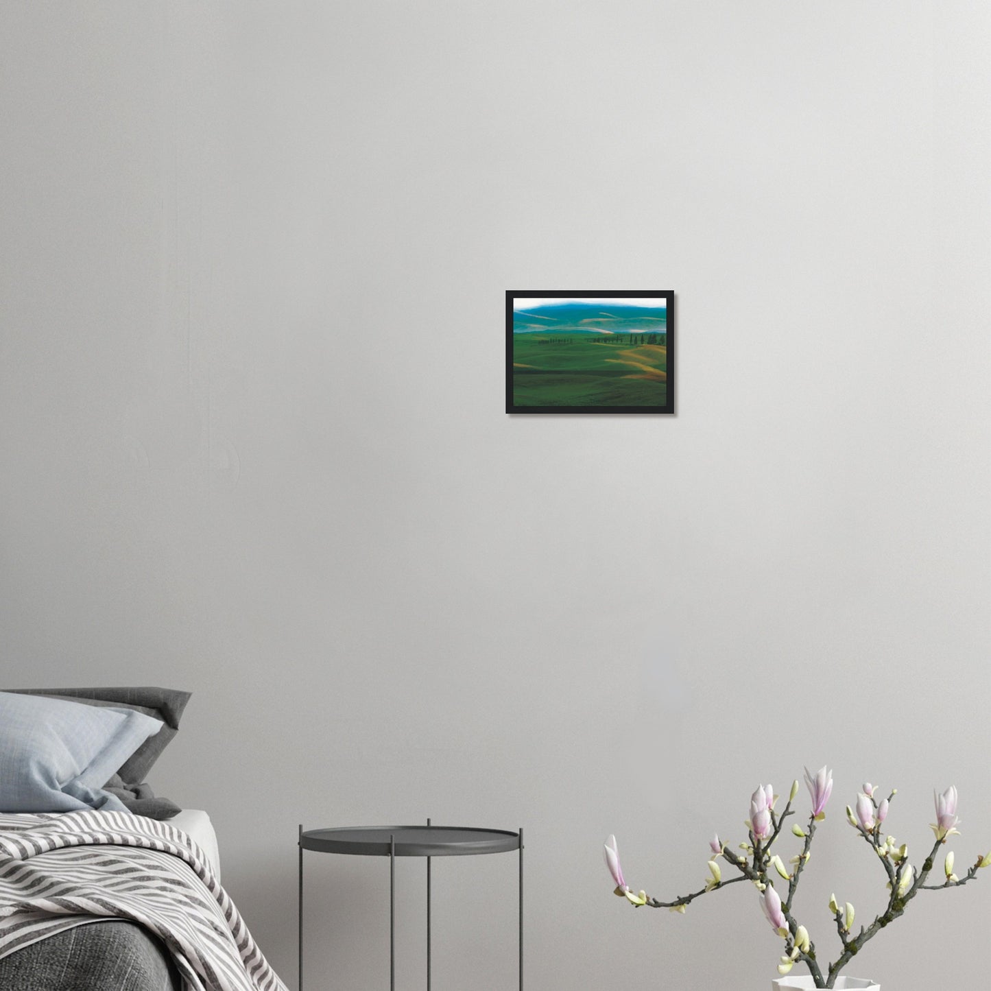 Artwork of rolling green hills and tall trees in soft golden light, evoking calm and quiet.