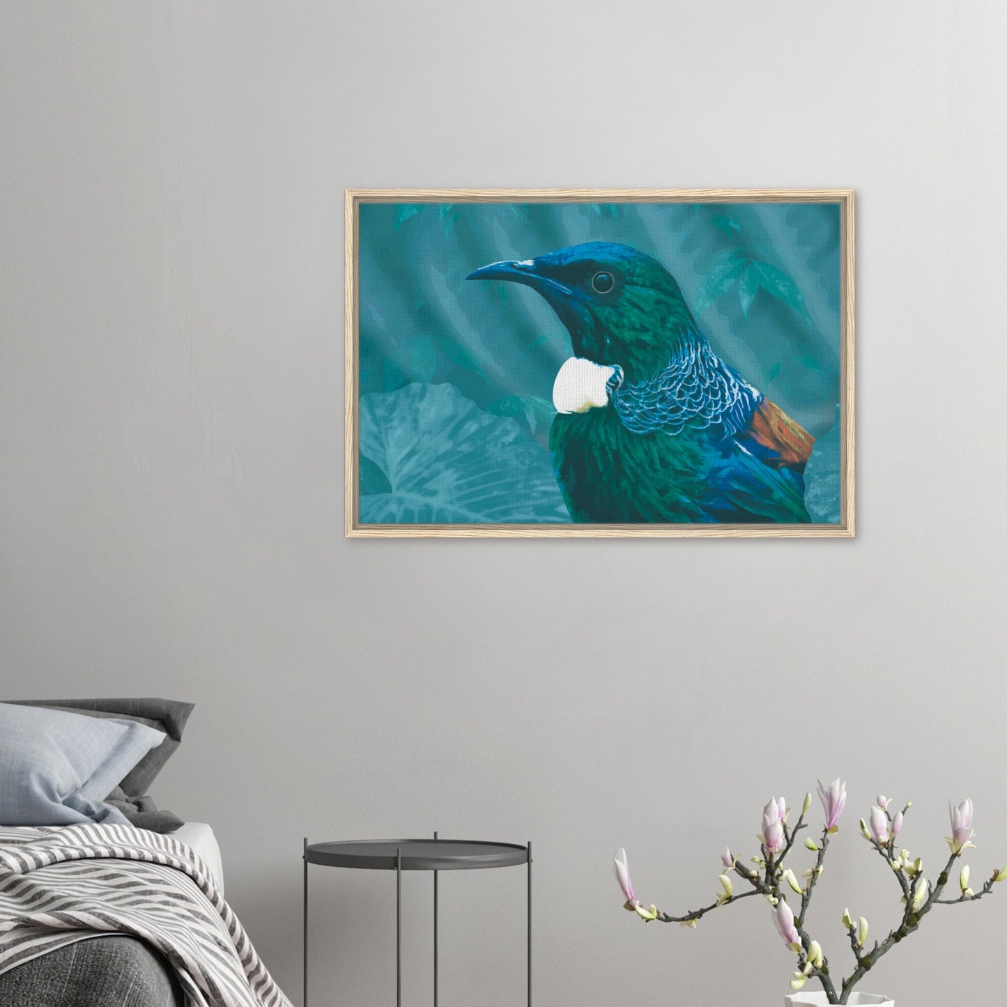 With rich teal and emerald hues and the tūī’s signature white throat tufts, the artwork evokes the dappled light of the forest and the bird’s melodic presence among the trees.