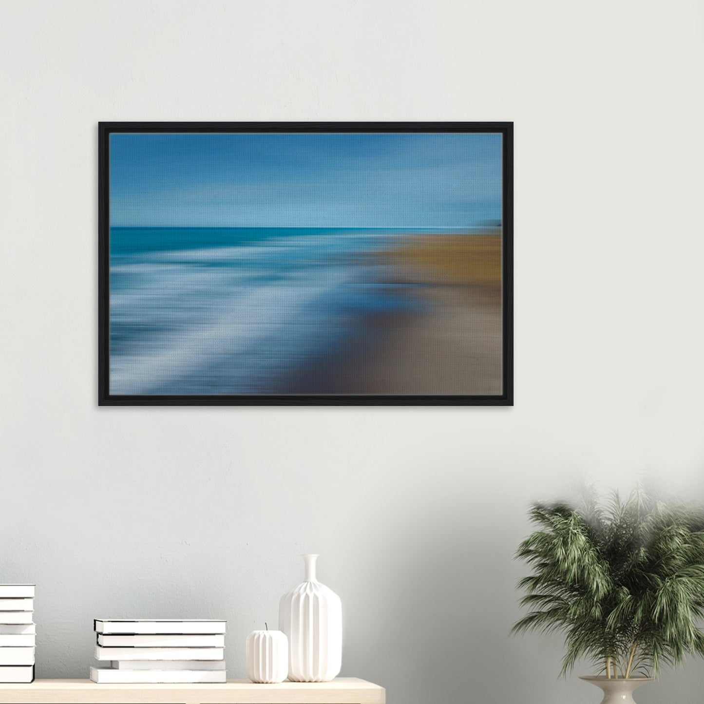 ‘Ocean breeze’ captures the movement of waves and shoreline in a beautifully blurred perspective, creating a dreamlike seascape of blues, teals, and sandy browns.