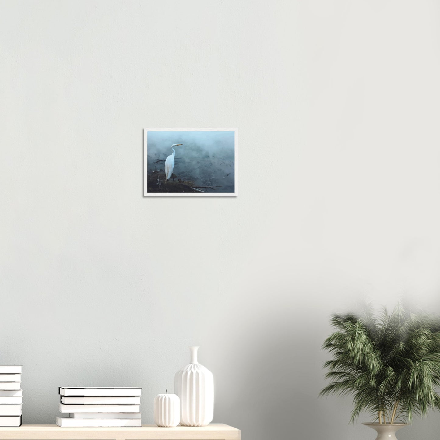 'Grace in the mist' captures the graceful presence of the Kōtuku (white heron) standing still on the edge of a steaming geothermal pool.