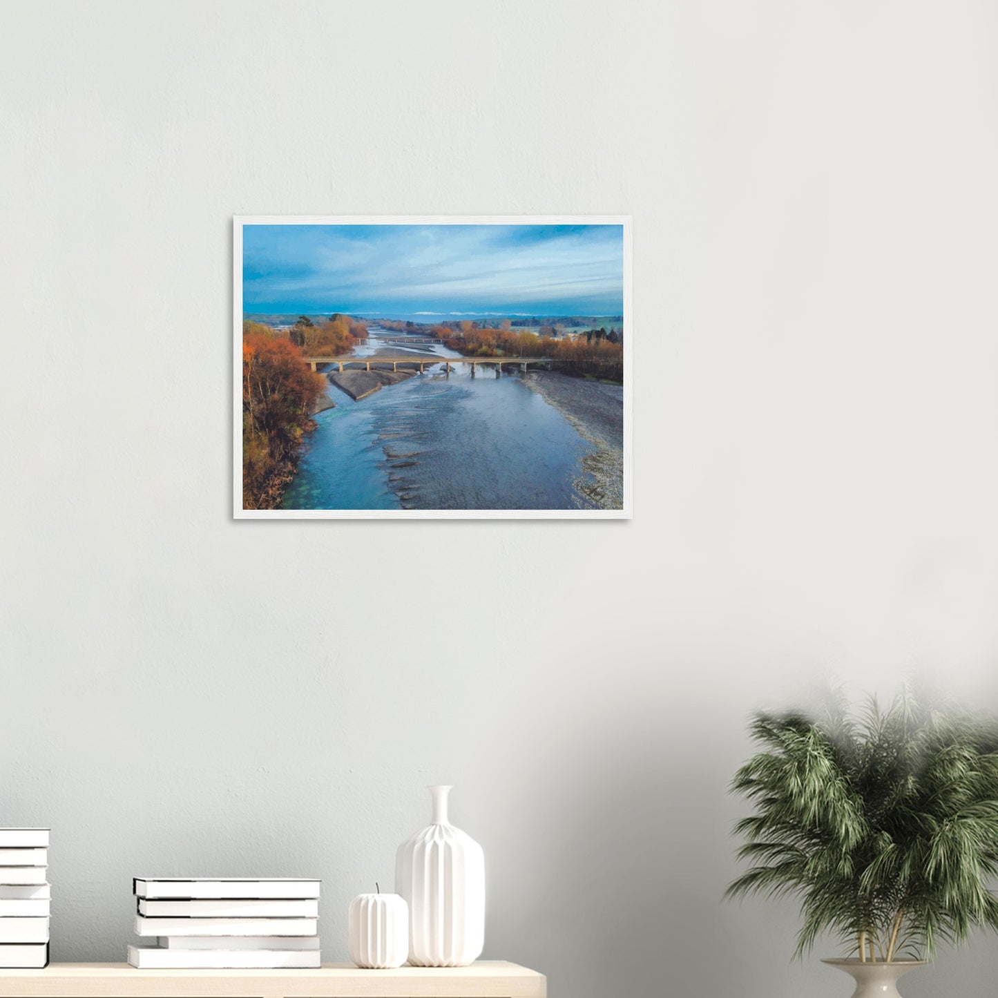 Aerial artwork of bridges crossing the Tuki Tuki River with the Ruahine Ranges in the distance, in cool, calm light.