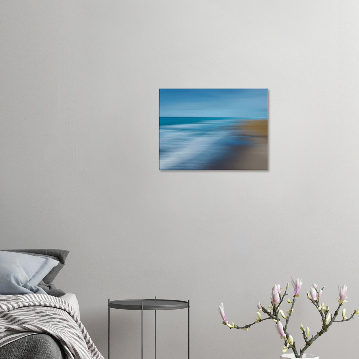 ‘Ocean breeze’ captures the movement of waves and shoreline in a beautifully blurred perspective, creating a dreamlike seascape of blues, teals, and sandy browns.