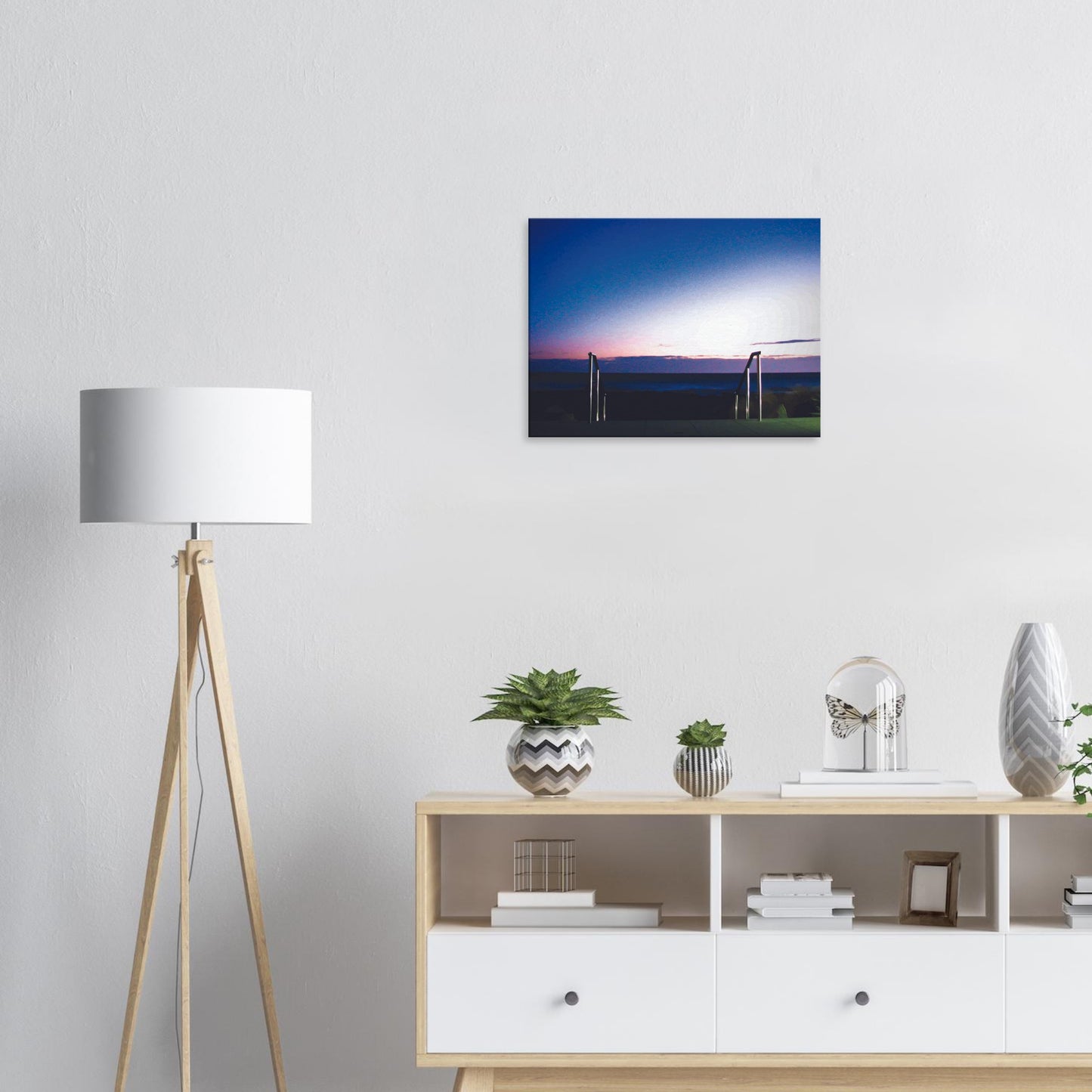 Artwork of Owhiro Bay at dusk with glowing horizon, sea, and steel railings leading into night.