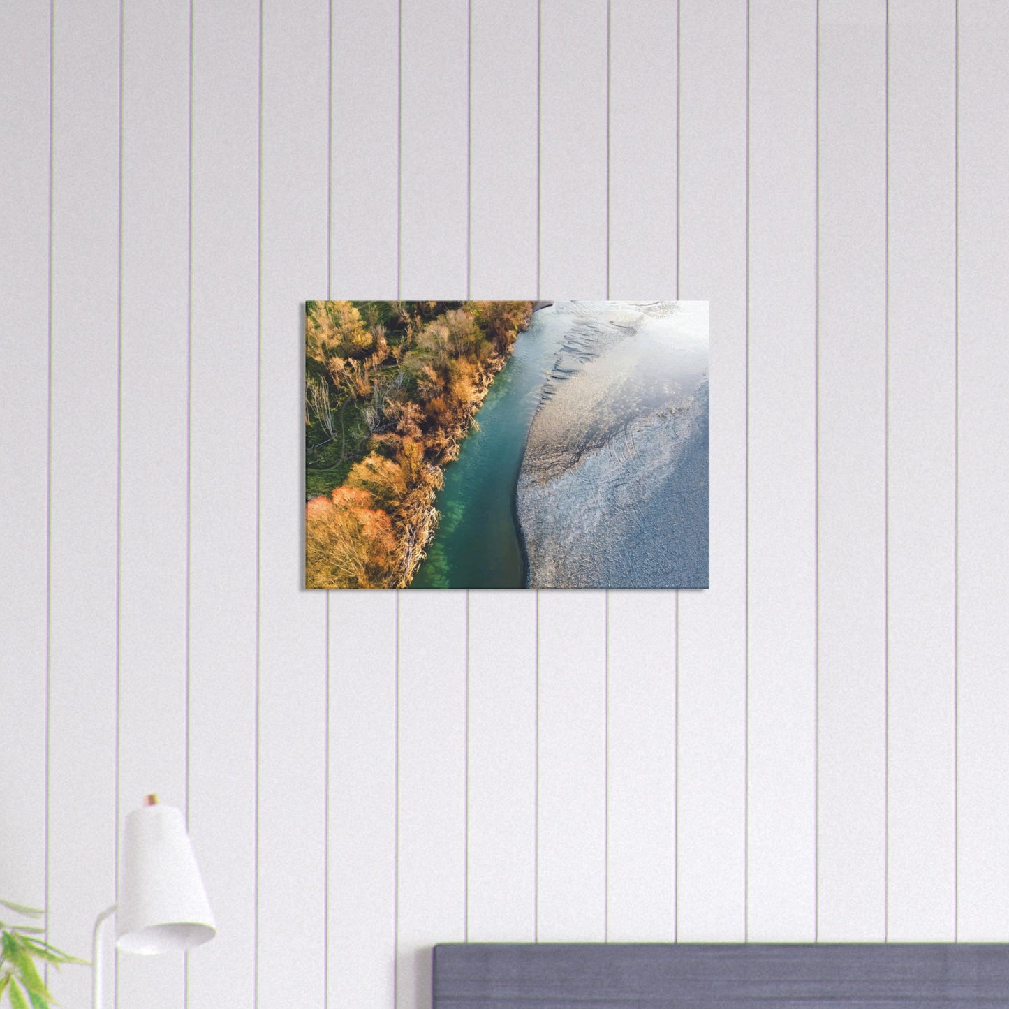 Aerial artwork of a New Zealand river’s edge, with turquoise water, golden trees, and soft shadows.