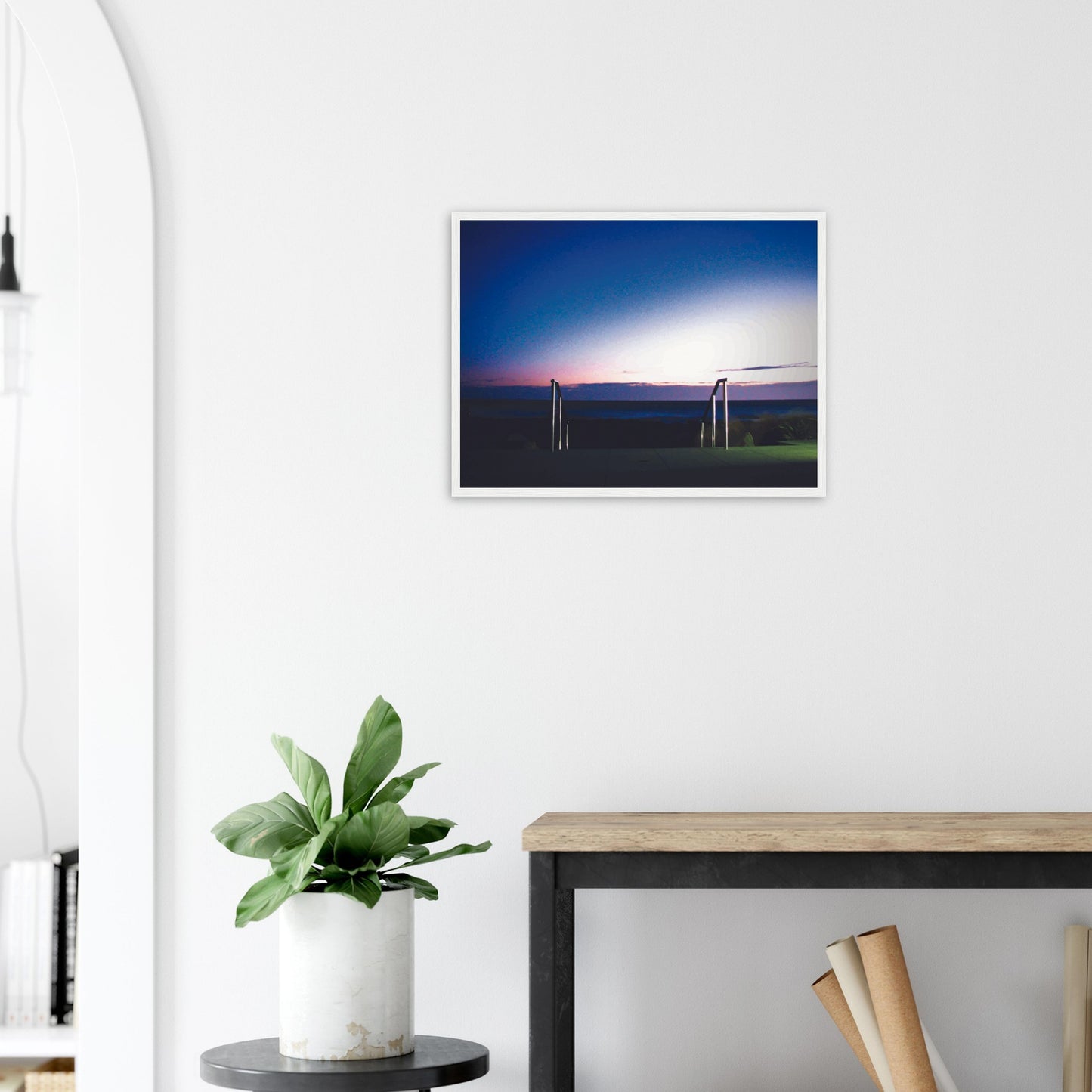 Artwork of Owhiro Bay at dusk with glowing horizon, sea, and steel railings leading into night.