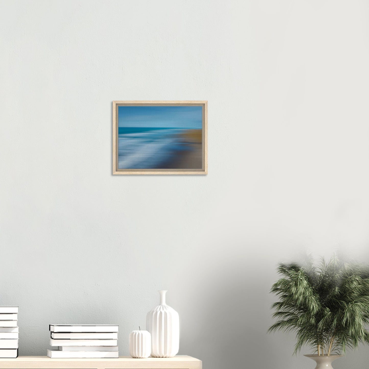 ‘Ocean breeze’ captures the movement of waves and shoreline in a beautifully blurred perspective, creating a dreamlike seascape of blues, teals, and sandy browns.
