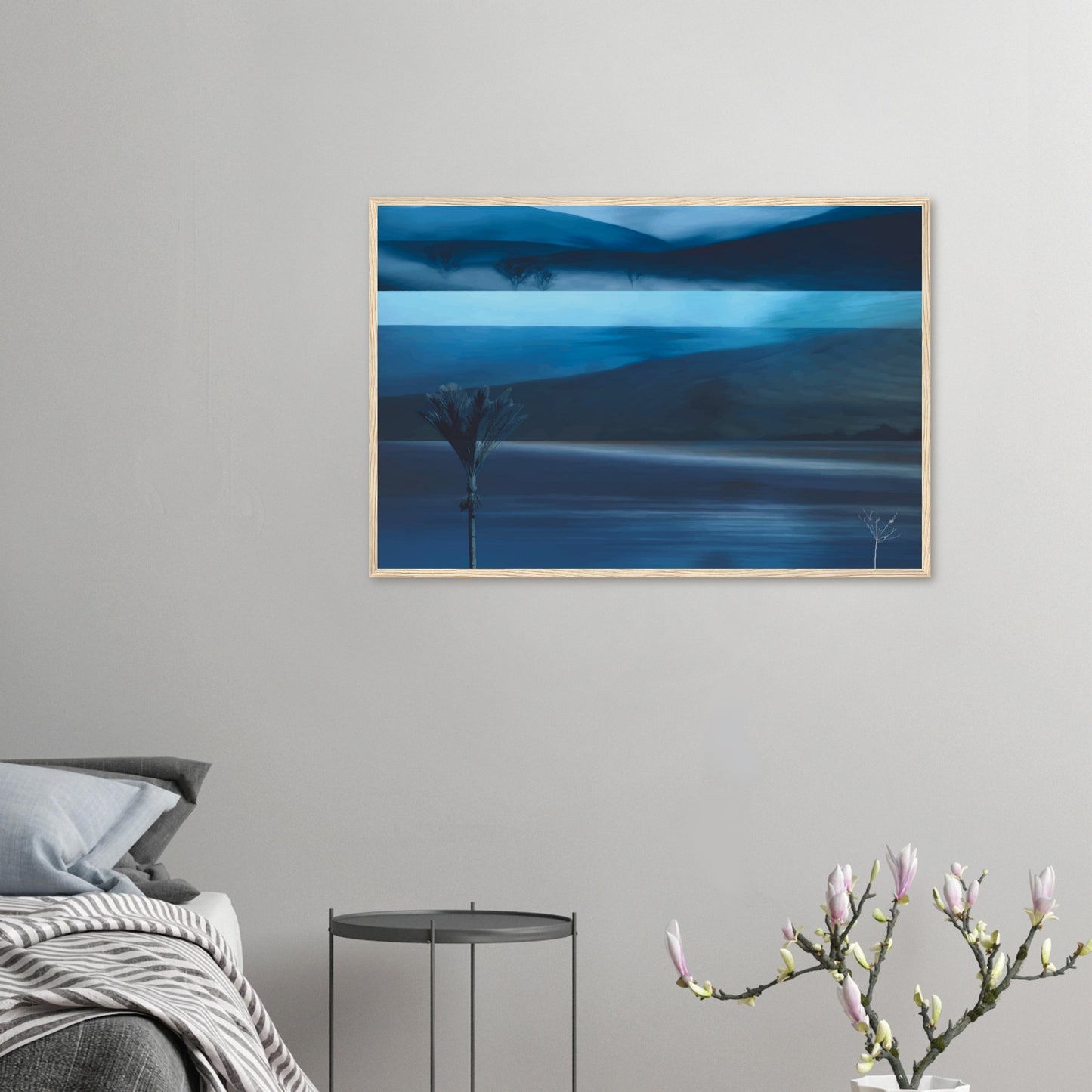 Layered blue seascape artwork with dark hills, water, and horizon in soft coastal tones.