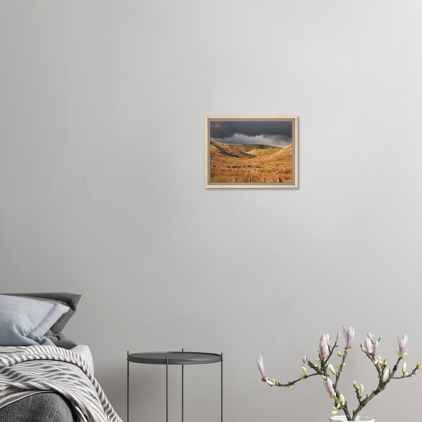 Golden Hawke’s Bay hills beneath dark clouds in a nostalgic NZ landscape artwork titled Trip Home by Ben Hart.