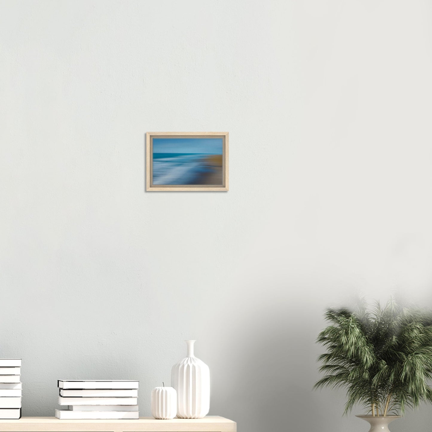 ‘Ocean breeze’ captures the movement of waves and shoreline in a beautifully blurred perspective, creating a dreamlike seascape of blues, teals, and sandy browns.