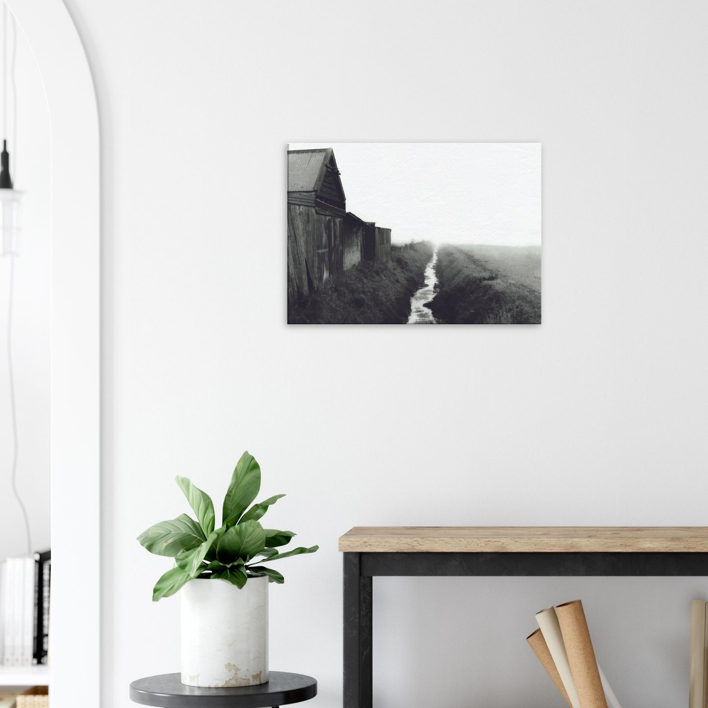 Moody artwork of a rustic barn and misty stream in rural New Zealand, evoking stillness and foggy morning light.