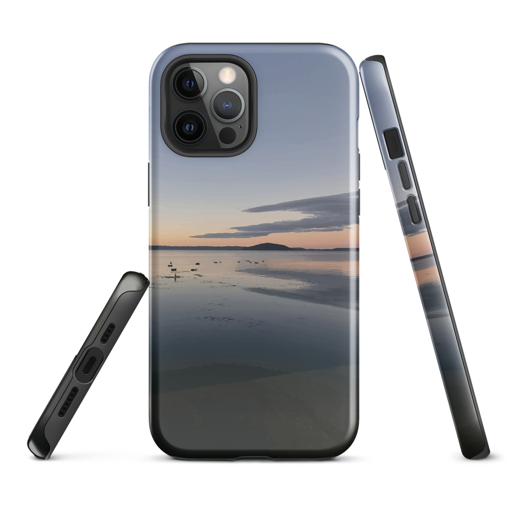 Phone case with tranquil lake scene at sunrise and distant hills.