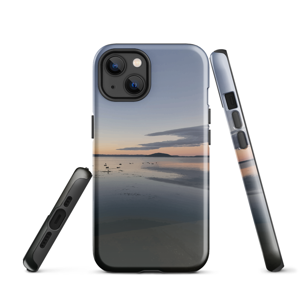 Phone case with tranquil lake scene at sunrise and distant hills.
