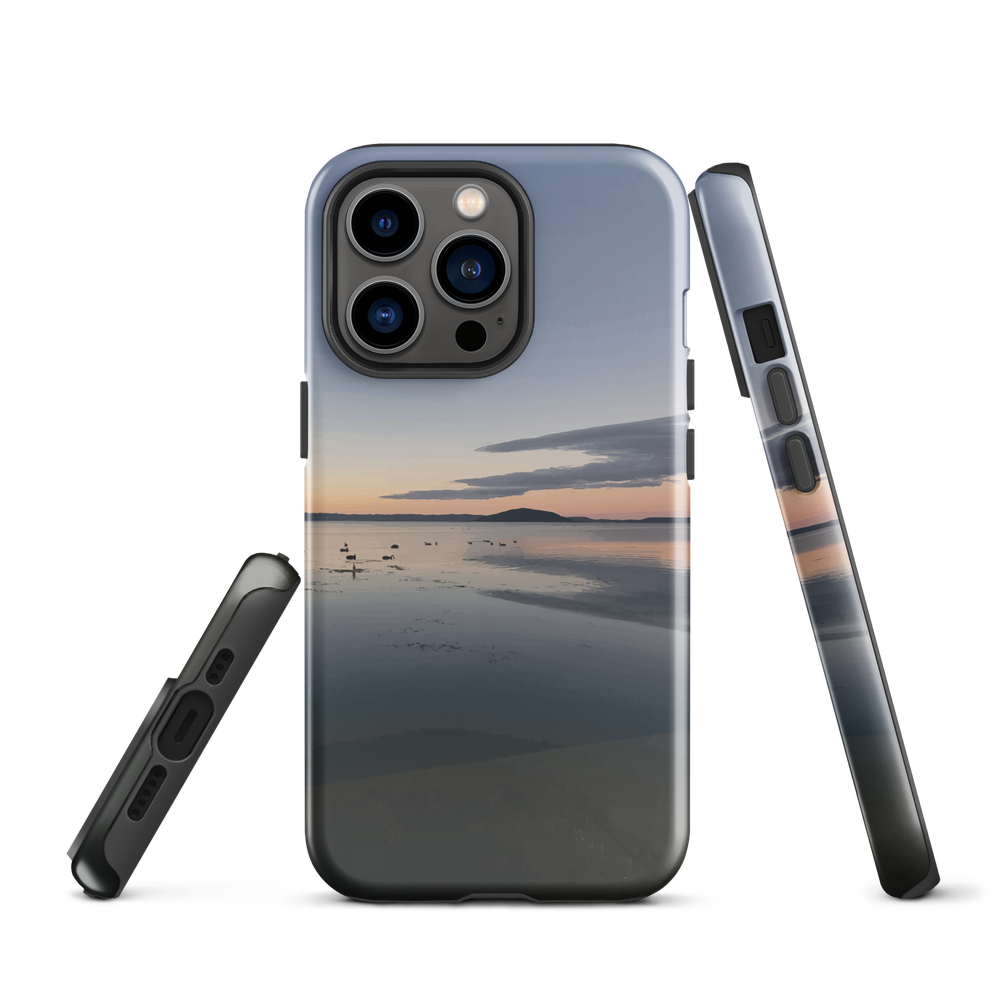 Phone case with tranquil lake scene at sunrise and distant hills.