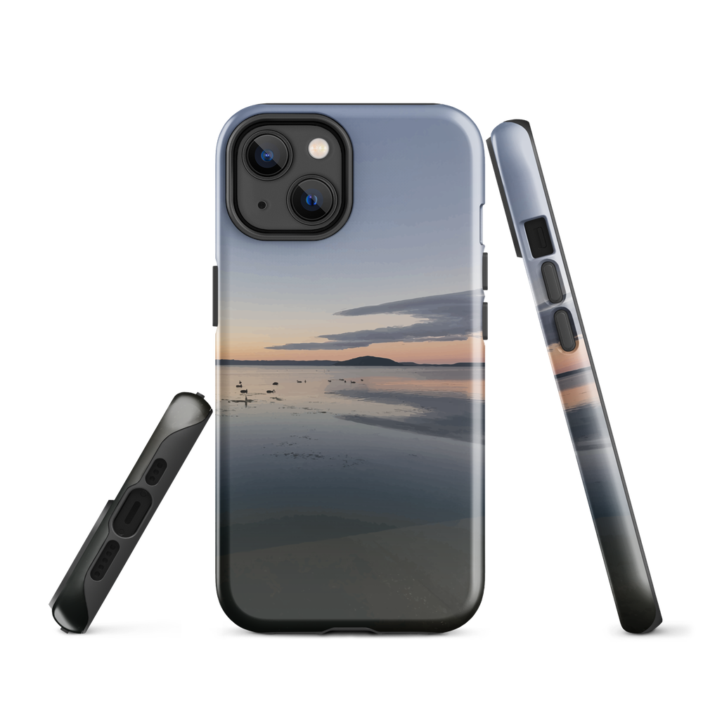 Phone case with tranquil lake scene at sunrise and distant hills.