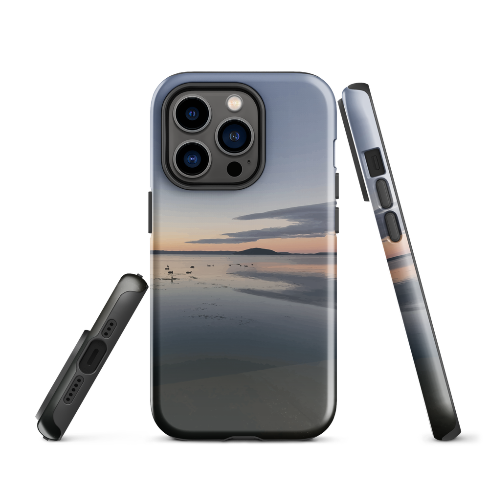 Phone case with tranquil lake scene at sunrise and distant hills.
