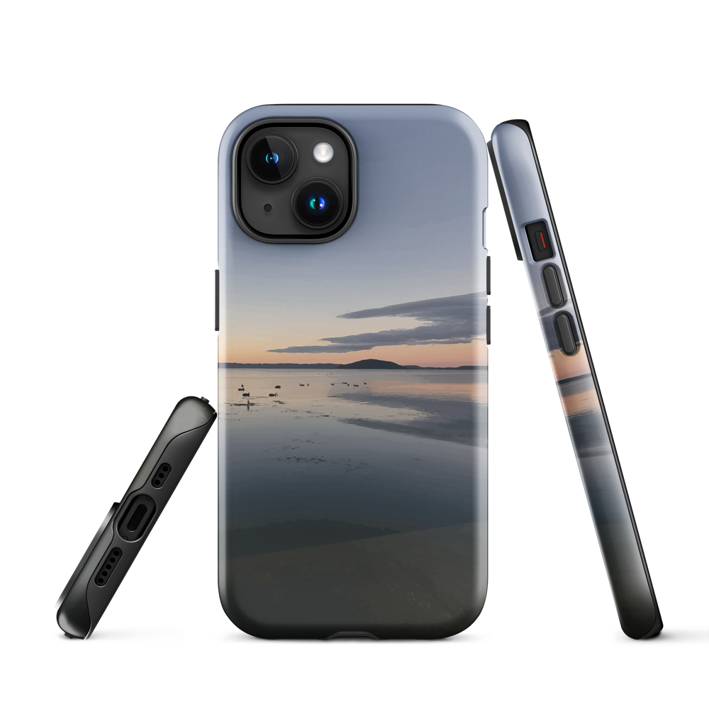 Phone case with tranquil lake scene at sunrise and distant hills.