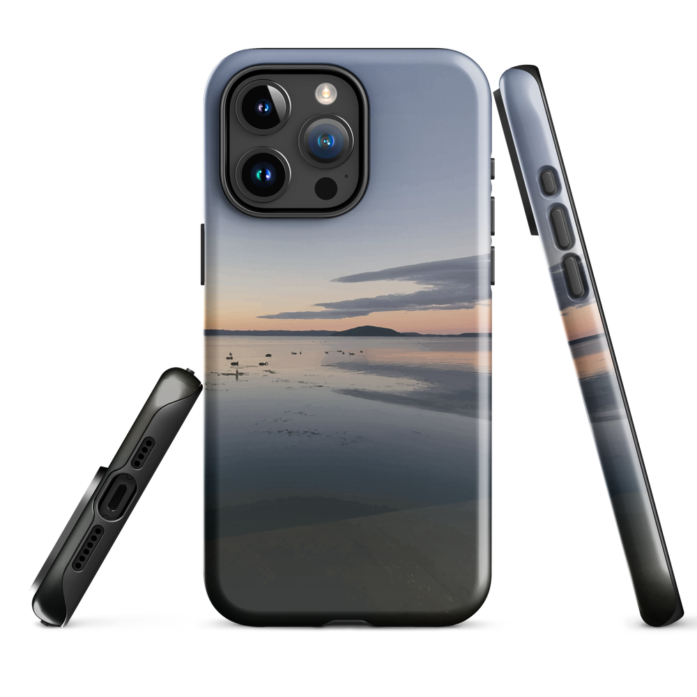 Phone case with tranquil lake scene at sunrise and distant hills.