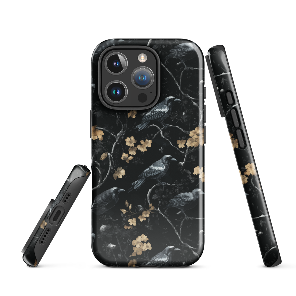 Dark phone case with blackbirds and gold blossoms on black branches.