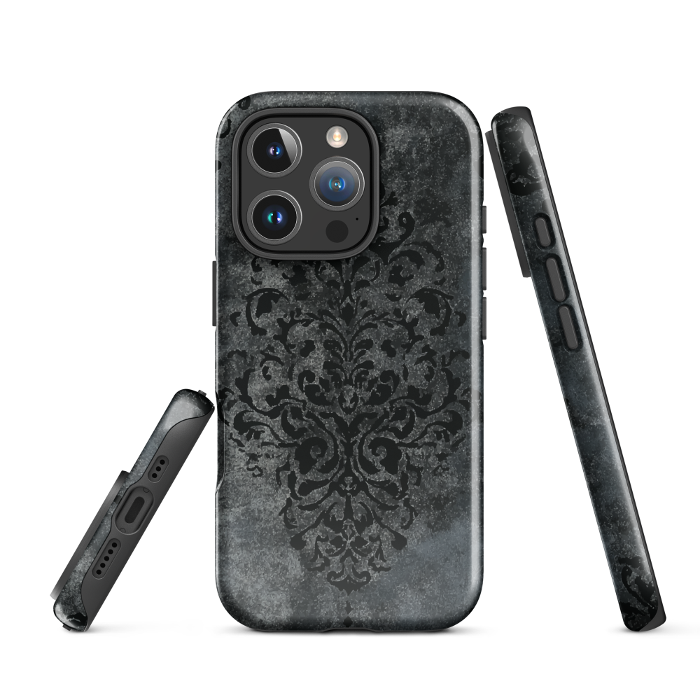 Dark damask patterned phone case with a vintage gothic aesthetic and textured stone background.
