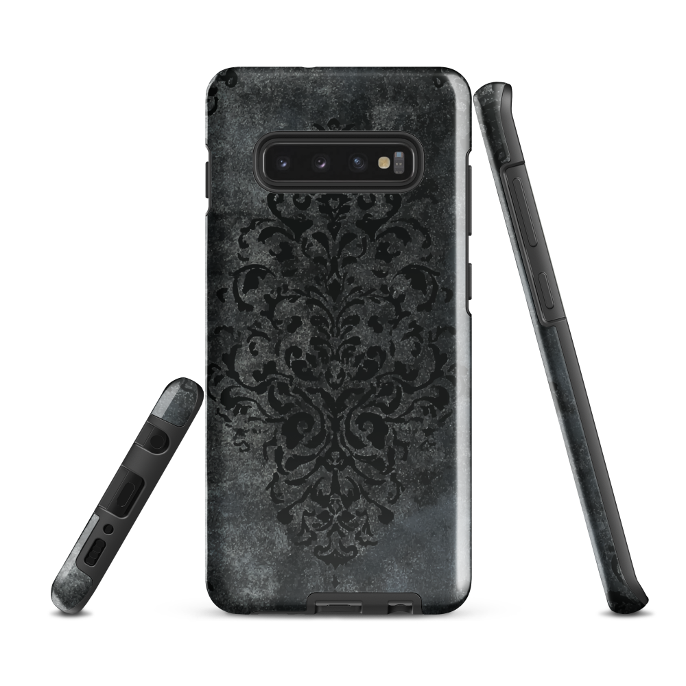 Dark damask patterned phone case with a vintage gothic aesthetic and textured stone background.