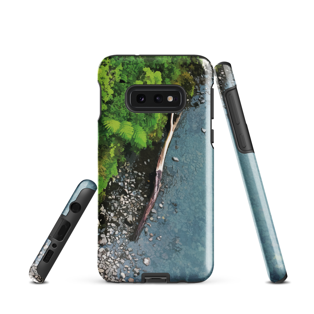 Resting Place phone case with aerial artwork of river rocks, green bush, and driftwood in a New Zealand stream.