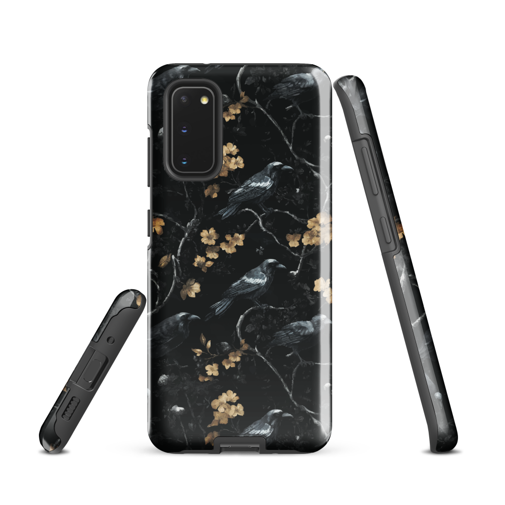 Dark phone case with blackbirds and gold blossoms on black branches.