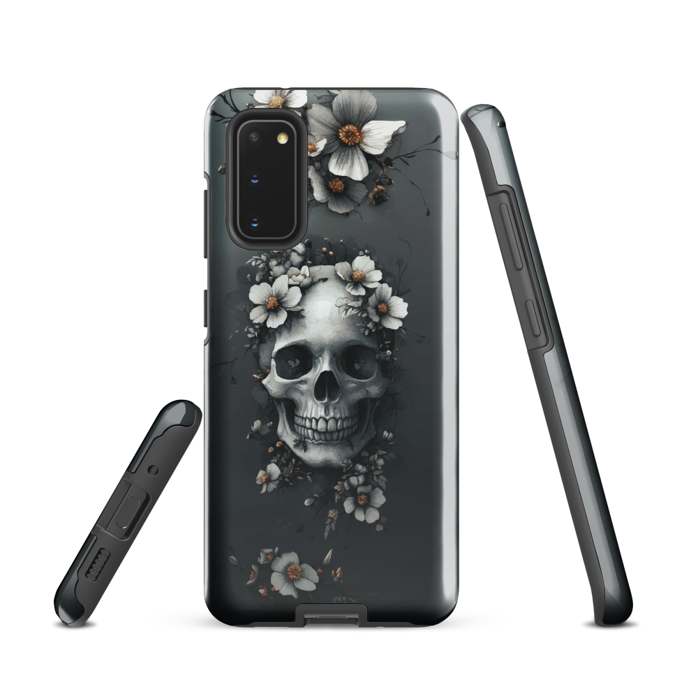 Gothic phone case with a floral skull design in grey tones, featuring white blossoms and dark detailing.