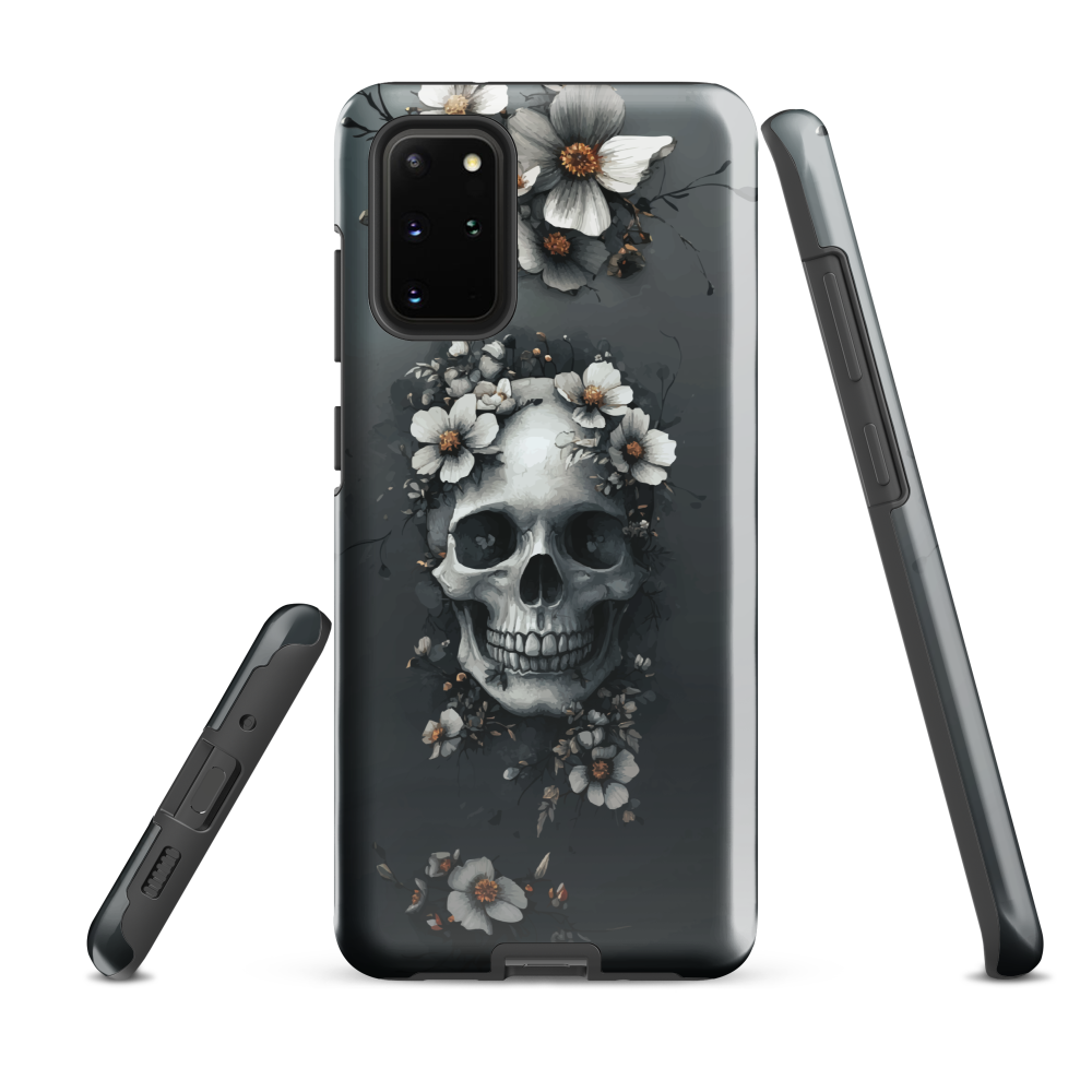 Gothic phone case with a floral skull design in grey tones, featuring white blossoms and dark detailing.