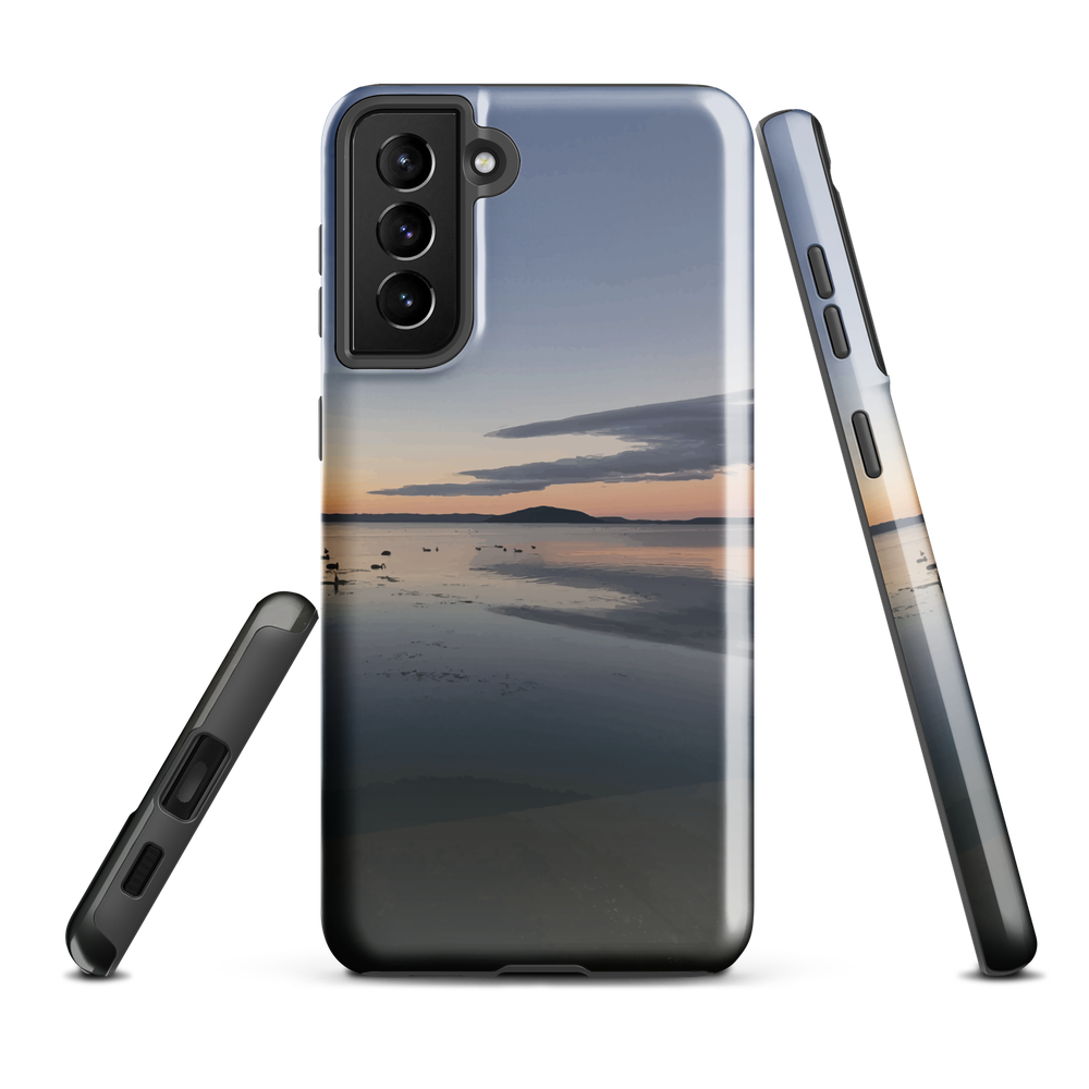 Phone case with tranquil lake scene at sunrise and distant hills.
