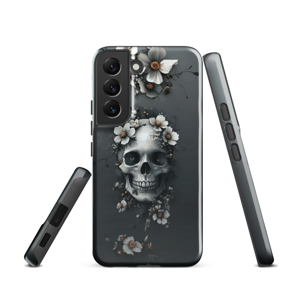 Gothic phone case with a floral skull design in grey tones, featuring white blossoms and dark detailing.
