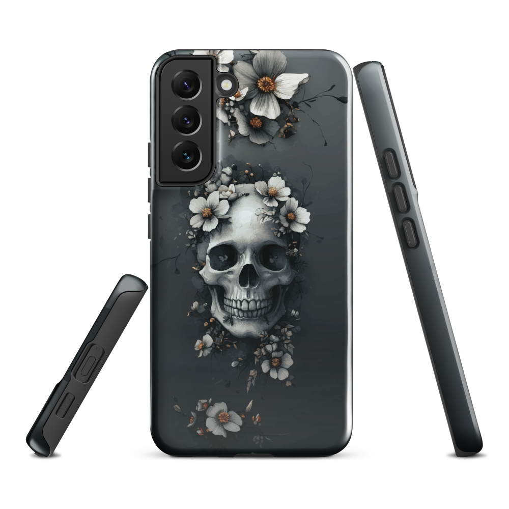 Gothic phone case with a floral skull design in grey tones, featuring white blossoms and dark detailing.